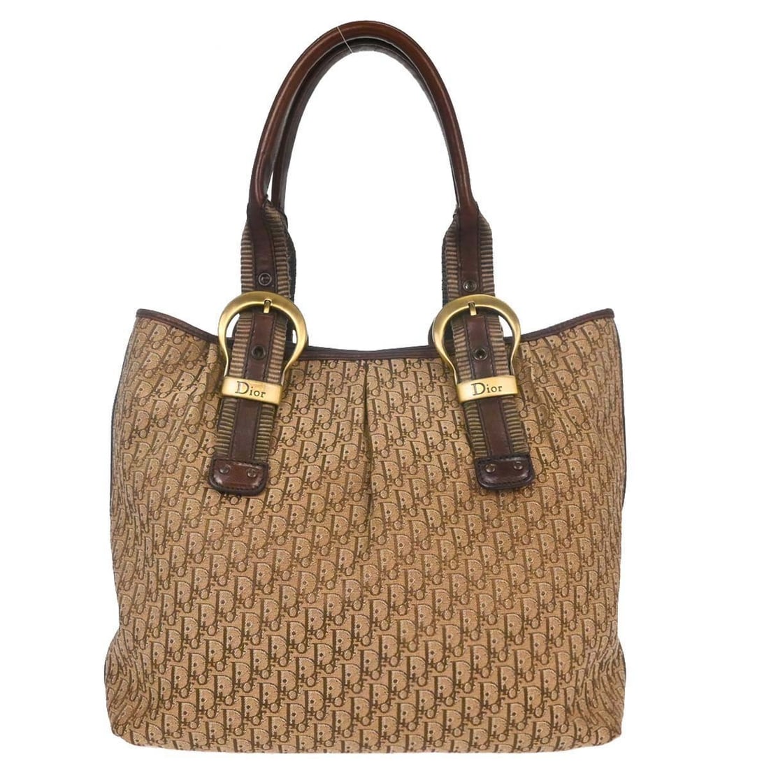 Dior Trotter Beige Canvas and Leather Tote Handbag Italy: Dior Trotter Beige Canvas and Leather Tote Handbag Italy Christian Dior Trotter tote handbag in beige canvas and leather with brown top handles, logo accents, and gold-color hardware. The bag features