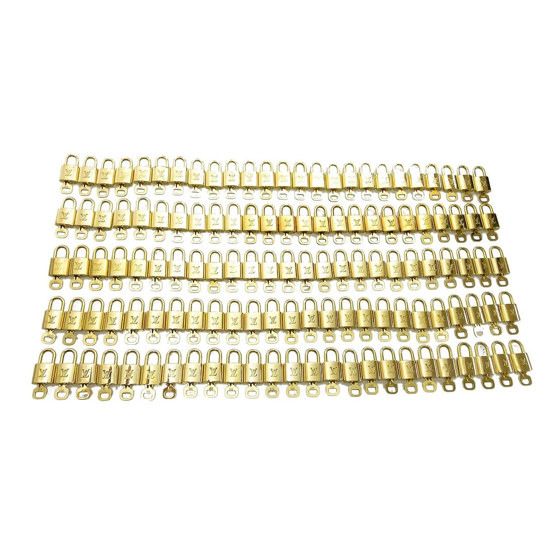 125 Piece Set Louis Vuitton Gold Tone Padlock and Key Charms: 125 Piece Set Louis Vuitton Gold Tone Padlock and Key Charms Set of 125 Louis Vuitton padlock and key bag accessory charms in a gold-tone finish. Made in France, this unisex accessory set shows overal