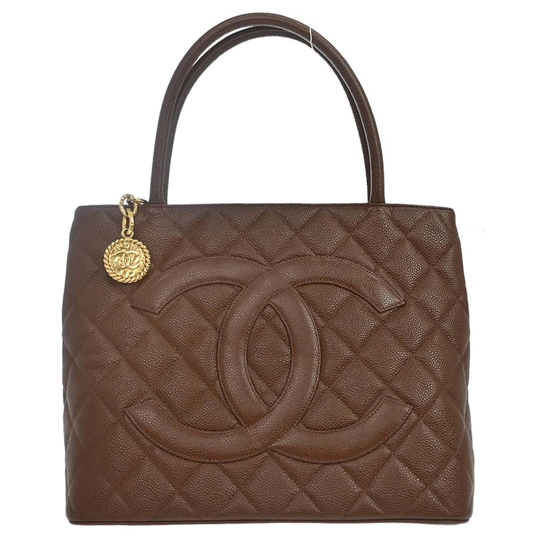 Chanel Medallion Brown Caviar Leather Tote Bag: Chanel Medallion Brown Caviar Leather Tote Bag Chanel Medallion tote handbag in brown caviar skin leather with matelasse quilting, double handles, zip-top closure, and leather lining. This medium tote