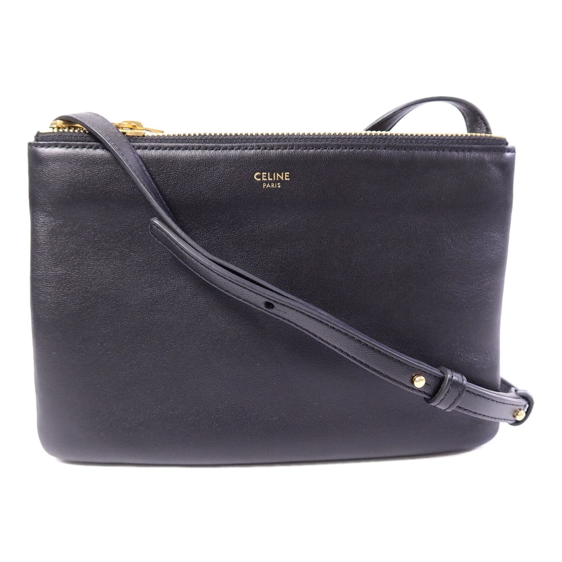 CELINE Trio Shoulder Bag Black Calfskin Leather GHW: CELINE Trio Shoulder Bag Black Calfskin Leather GHW Celine Trio shoulder bag in black calfskin leather with gold-tone hardware. This women's shoulder bag features a slim profile with two zip pockets a
