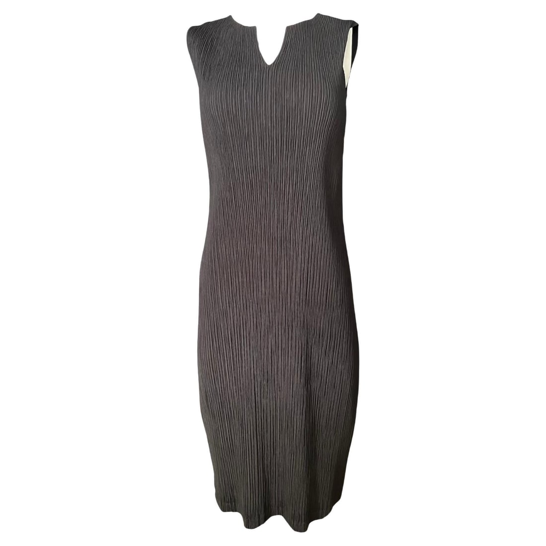Issey Miyake Pleated Mesh Sleeveless Mid Length Dress Size 2: Issey Miyake Pleated Mesh Sleeveless Mid Length Dress Size 2 A black midi dress by Issey Miyake, made in Japan and crafted in the brand's signature pleated mesh fabric. This sleeveless, mid-length dre