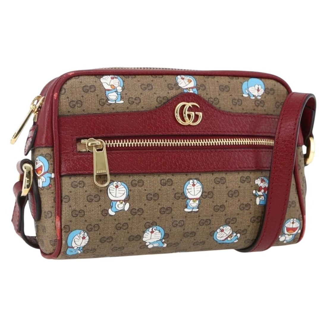 Gucci x Doraemon Beige Micro GG Supreme Shoulder Bag 647784: Gucci x Doraemon Beige Micro GG Supreme Shoulder Bag 647784 Gucci x Doraemon shoulder bag in beige Micro GG Supreme canvas with PVC leather trim and gold-tone accents. Made in Italy, this women's bag 