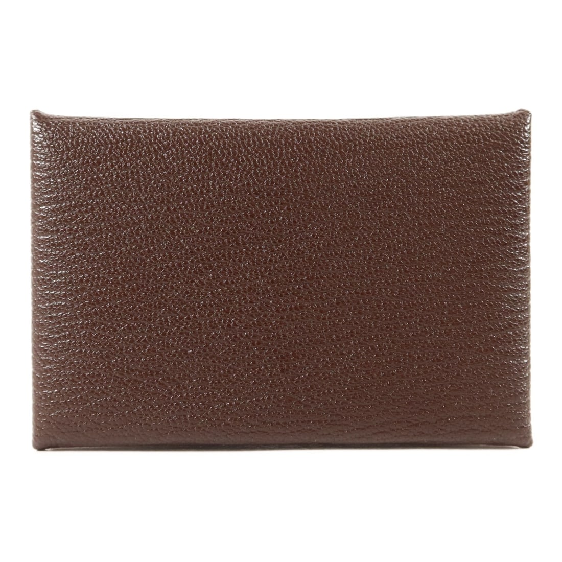 Hermes Calvi goatskin card case Terre brown palladium hardware: Hermes Calvi goatskin card case Terre brown palladium hardware Hermes Calvi card case in Chevre goatskin leather with a brown Terre finish. This unisex card case features a hook button closure and