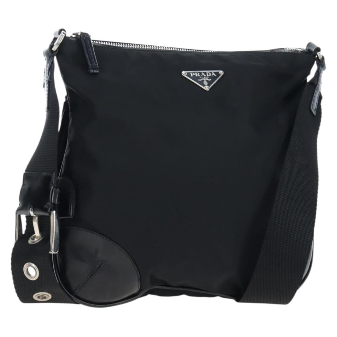 PRADA Nylon Shoulder Bag in Black with Silver Tone Dust Bag: PRADA Nylon Shoulder Bag in Black with Silver Tone Dust Bag Authentic Prada shoulder bag in black nylon with silver-tone accents. This women's bag includes a dust bag and is made in Italy. Condition i