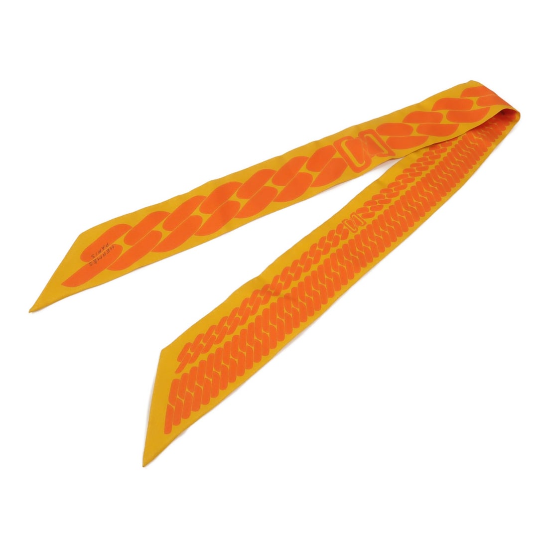 HERMES Twilly Silk Scarf Orange France: HERMES Twilly Silk Scarf Orange France Hermes Twilly scarf in orange silk, designed for women and presented in very good AB condition. The item is described as a regular size scarf made in France, wit