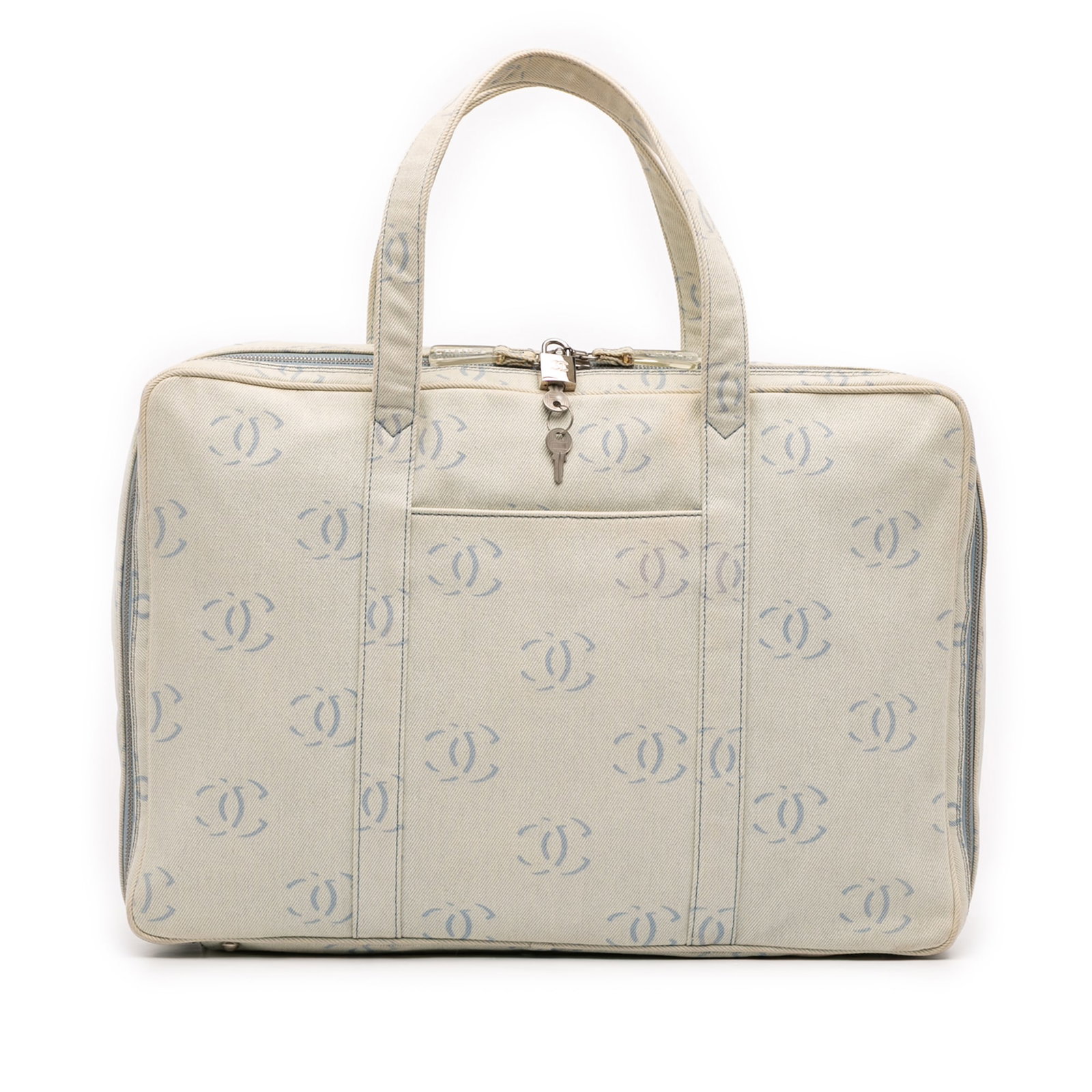 Chanel CC Denim Travel Bag Blue Fabric Italy: Chanel CC Denim Travel Bag Blue Fabric Italy The Chanel CC Denim Travel Bag showcases a stylish denim body, complemented by flat denim top handles for comfortable carrying. This versatile bag features
