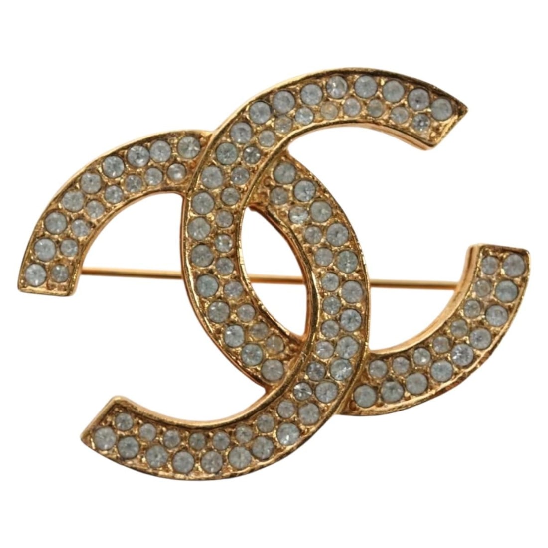 Gold Tone Metal Brooch CHANEL COCO Mark CC: Gold Tone Metal Brooch CHANEL COCO Mark CC Authentic CHANEL COCO Mark brooch in gold-tone metal. This women's brooch features the iconic CC motif and is offered in very good condition with visible sur