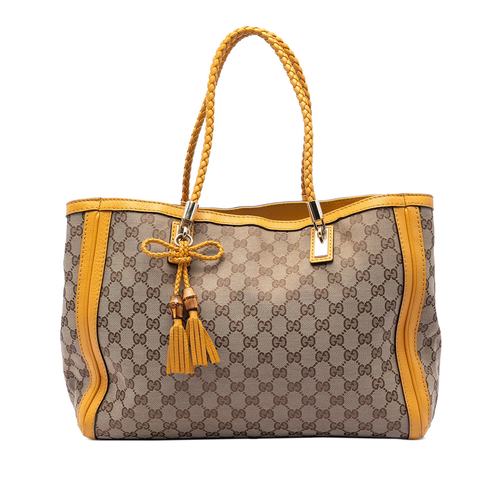 Gucci Bella Tote GG Canvas Beige Leather Trim: Gucci Bella Tote GG Canvas Beige Leather Trim This Gucci GG Canvas Bella Tote features a beige canvas body accented with leather trim and braided leather straps. The bag is designed with an open top s