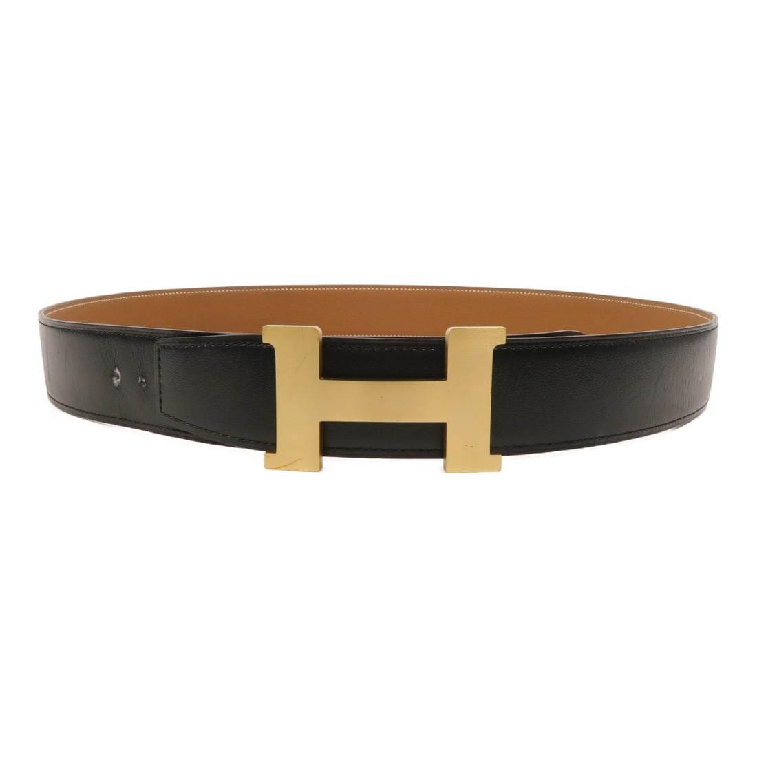 Hermes Constance H reversible calfskin belt black brown gold size 105: Hermes Constance H reversible calfskin belt black brown gold size 105 Reversible Hermes Constance H logo belt in black and brown leather with a gold-tone buckle. Made in France, this men's belt shows 