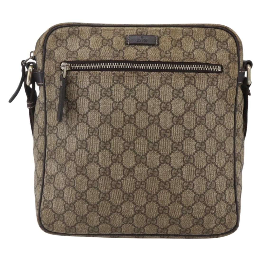Brown GG Canvas Messenger Bag with Front Zipper by Gucci: Brown GG Canvas Messenger Bag with Front Zipper by Gucci This Gucci Front Zip Messenger bag is crafted from GG coated canvas in brown and designed for female users. It features a front zip closure and