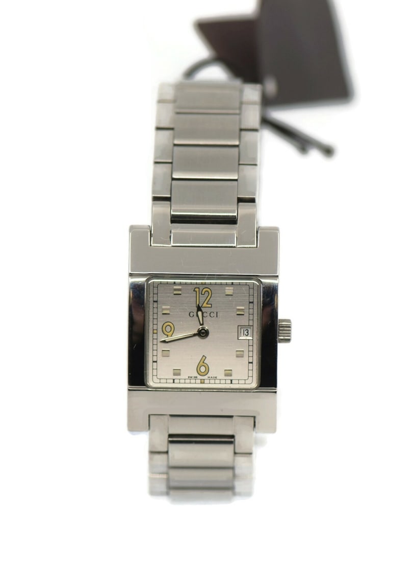 Gucci YA077512 Stainless Steel Quartz Wristwatch with Box and Papers: Gucci YA077512 Stainless Steel Quartz Wristwatch with Box and Papers This exquisite Gucci wristwatch features a robust stainless steel case and band, showcasing a sleek silver dial. Designed for elega
