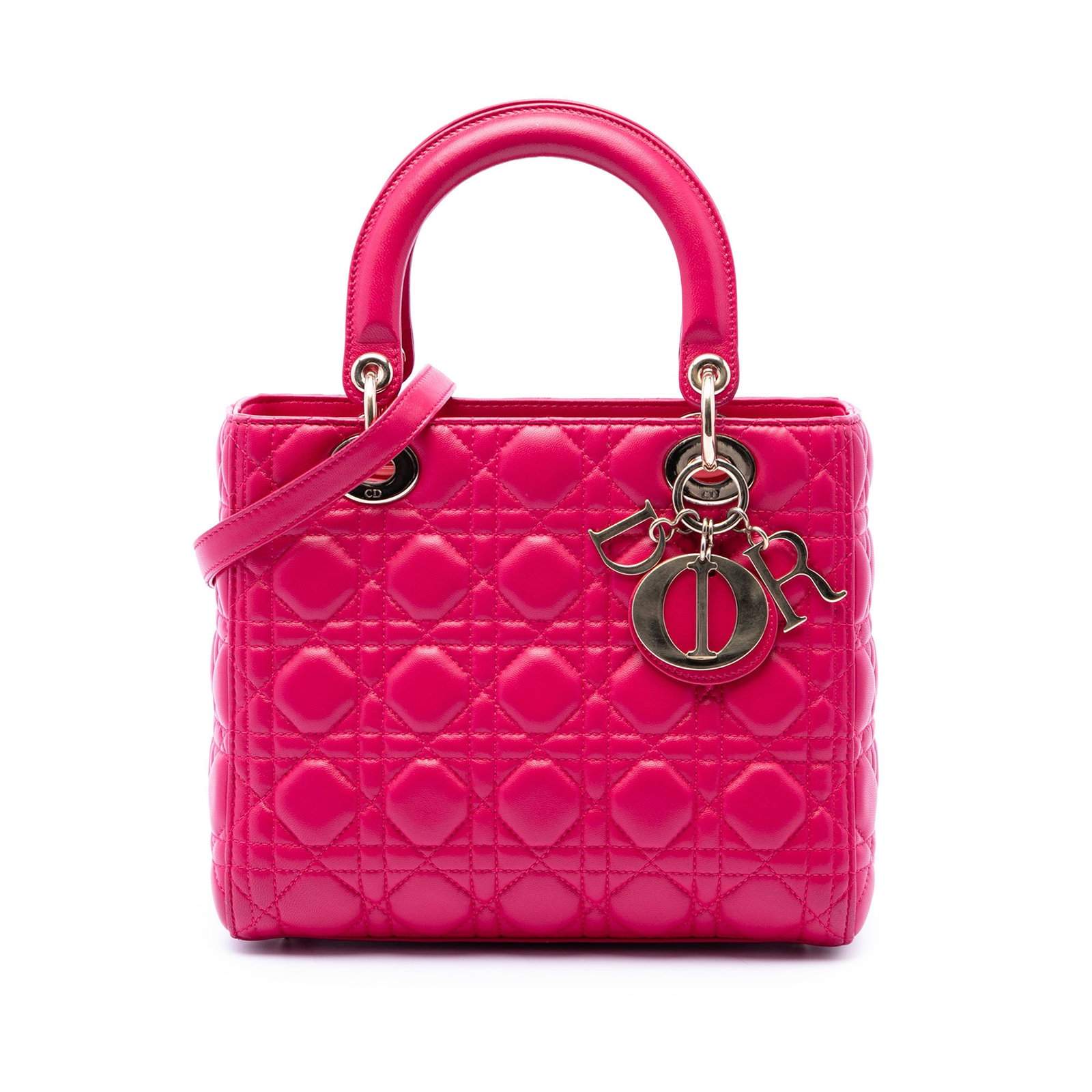 Dior Lady Dior Medium Pink Cannage Lambskin Handbag: Dior Lady Dior Medium Pink Cannage Lambskin Handbag The Medium Lambskin Cannage Lady Dior is a pink leather bag made in Italy. It features a quilted lambskin leather body, flat leather top handles, a 