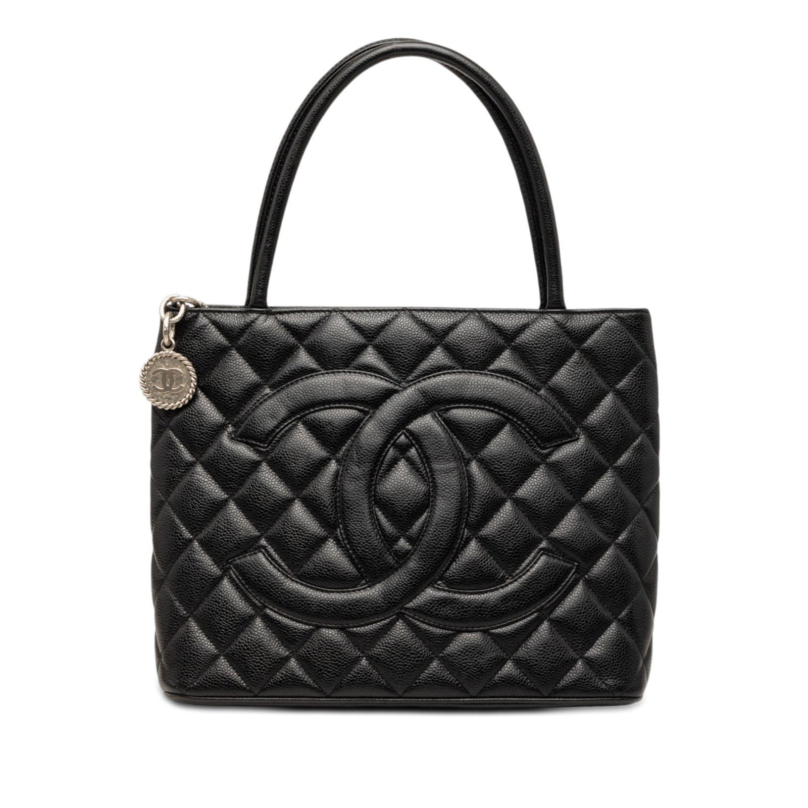 Chanel Medallion Tote Black Caviar Leather Handbag: Chanel Medallion Tote Black Caviar Leather Handbag Chanel Caviar Medallion Tote bag in black, crafted with a quilted caviar leather body and leather handles. It features a top zip closure, an exterior