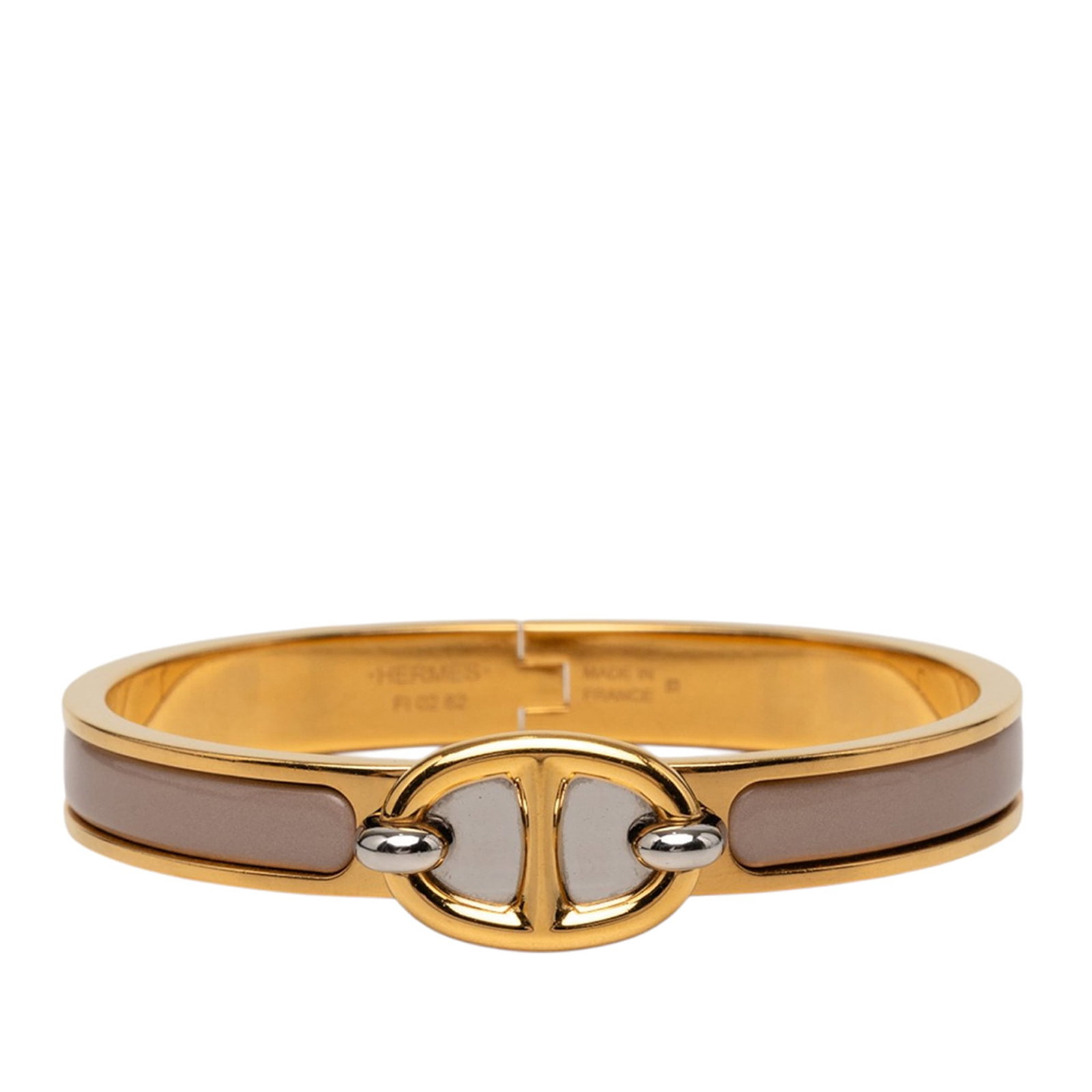 Hermes Clic Chaine d Ancre Enamel Bracelet PM Brown: Hermes Clic Chaine d Ancre Enamel Bracelet PM Brown This Hermes Mini Enamel Clic Chaine d'Ancre Bracelet PM features a brown enamel body complemented by a metal clasp closure. Made in France, this cos
