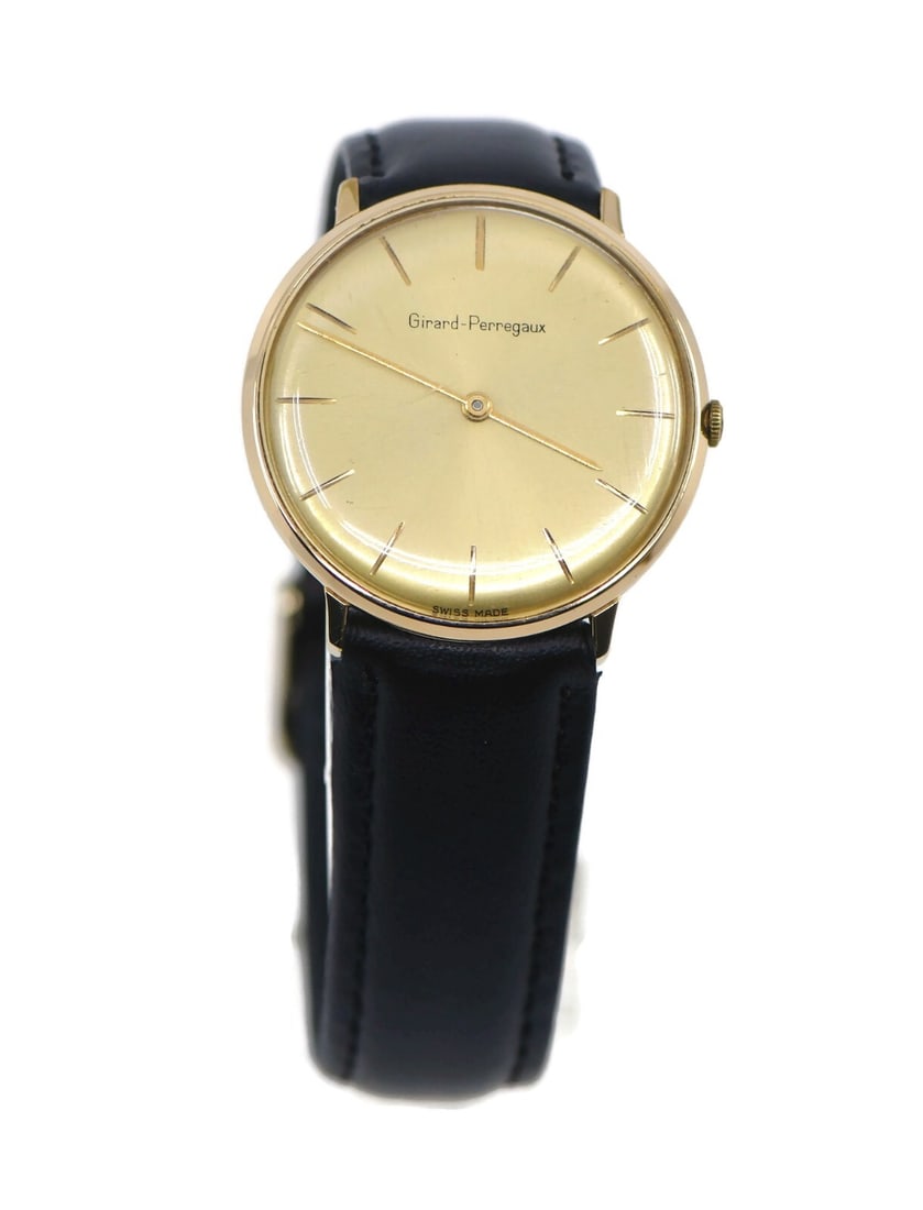Girard-Perregaux Two Tone Stainless Steel Mechanical Wristwatch 33mm: Girard-Perregaux Two Tone Stainless Steel Mechanical Wristwatch 33mm This exquisite Girard-Perregaux wristwatch showcases a classic two-tone design, combining elegant stainless steel with luxurious
