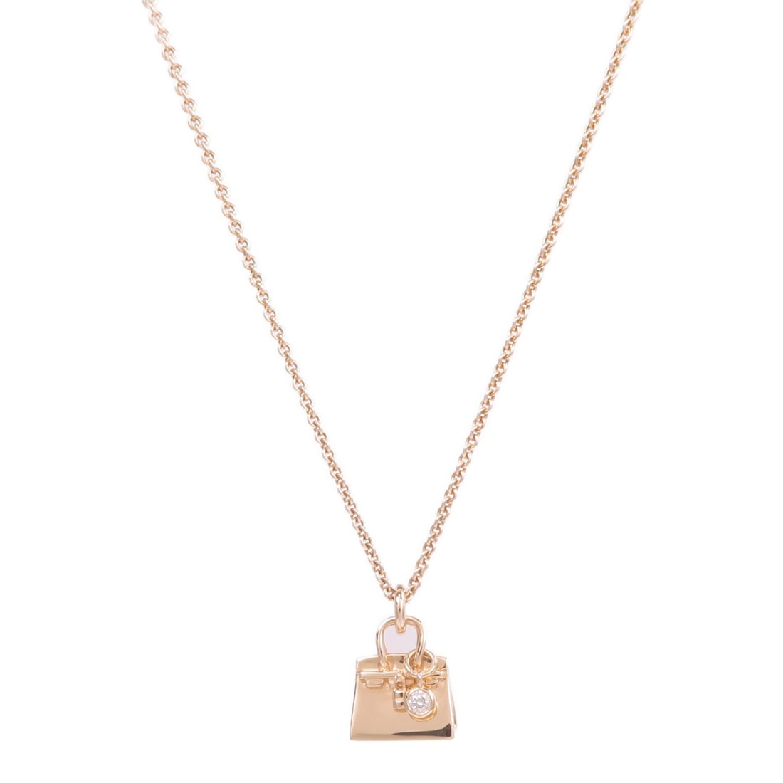 Hermes Kelly diamond necklace in 18K rose gold: Hermes Kelly diamond necklace in 18K rose gold Hermes Kelly diamond necklace crafted in 18K rose gold. This women's necklace features a clear diamond design and includes a storage box and guarantee. C