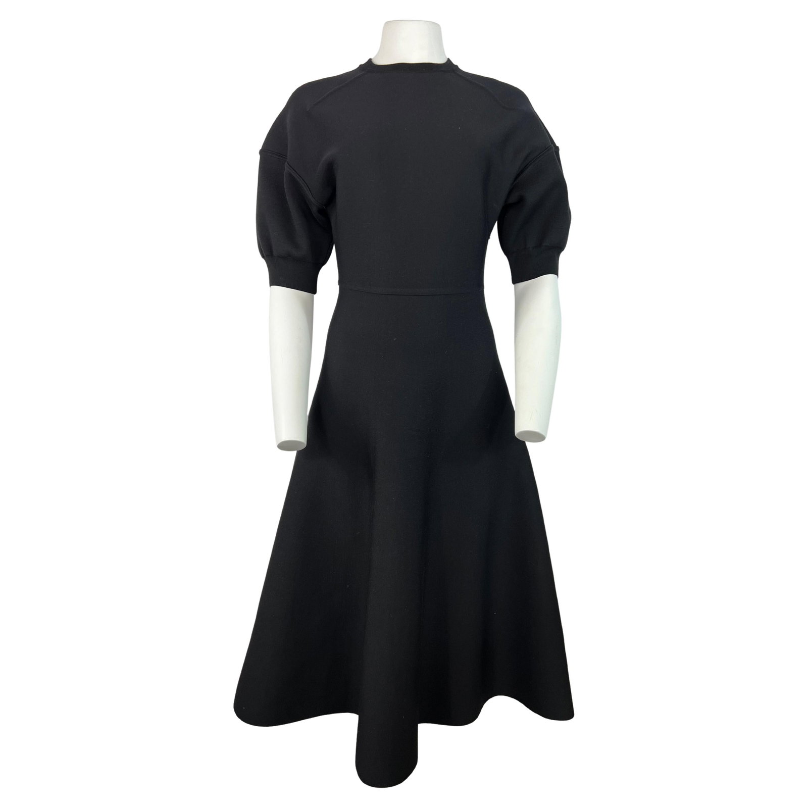 Christian Dior wool flare midi dress in black size 6: Christian Dior wool flare midi dress in black size 6 A Christian Dior black wool midi dress in excellent condition, made in France and from the 2010- period. It features a crew neckline, short balloon