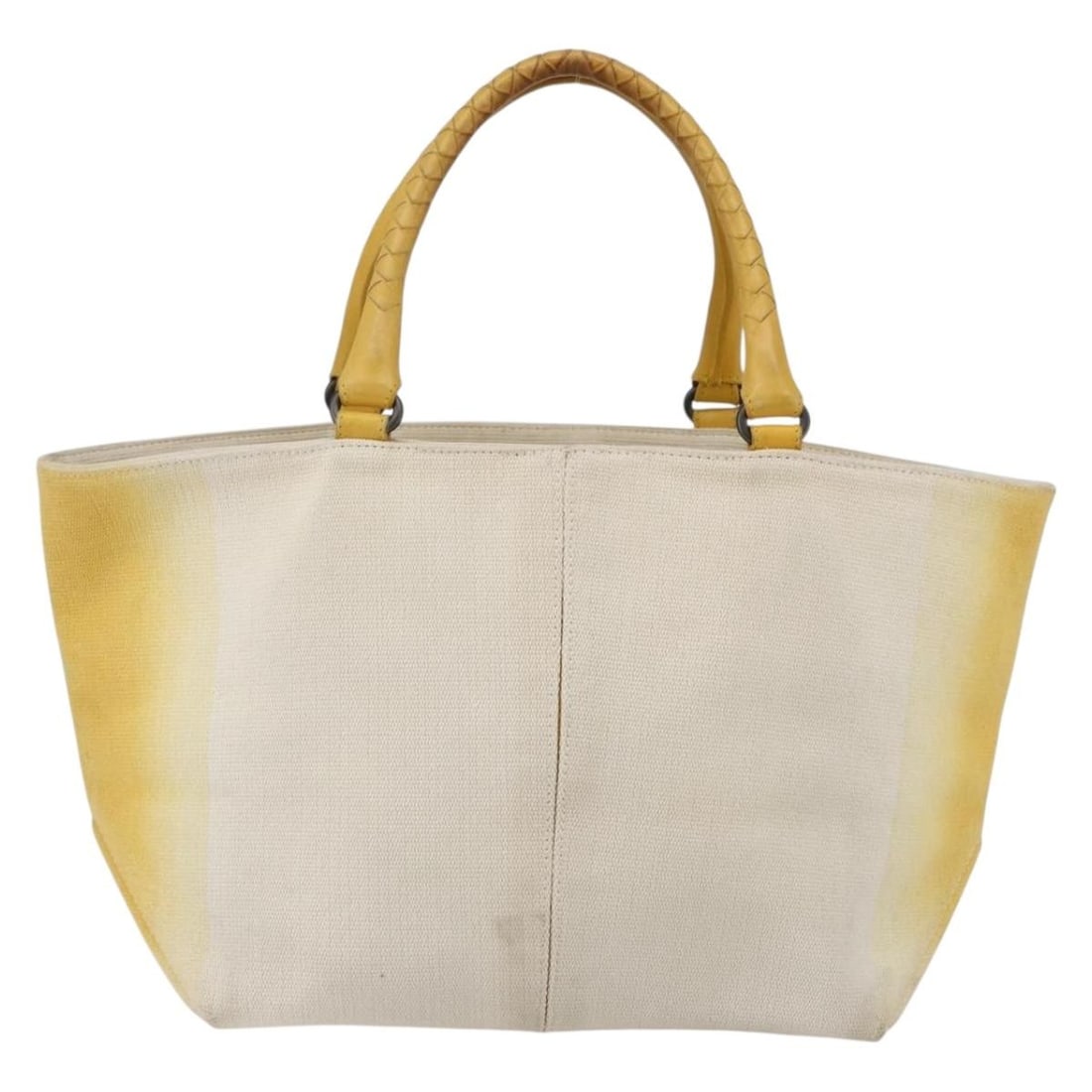 Canvas and Leather Open Tote by Bottega Veneta with Braided Handles: Canvas and Leather Open Tote by Bottega Veneta with Braided Handles This Bottega Veneta Braided Handle Open Tote Bag features a yellow canvas exterior complemented by leather details. Designed for wom