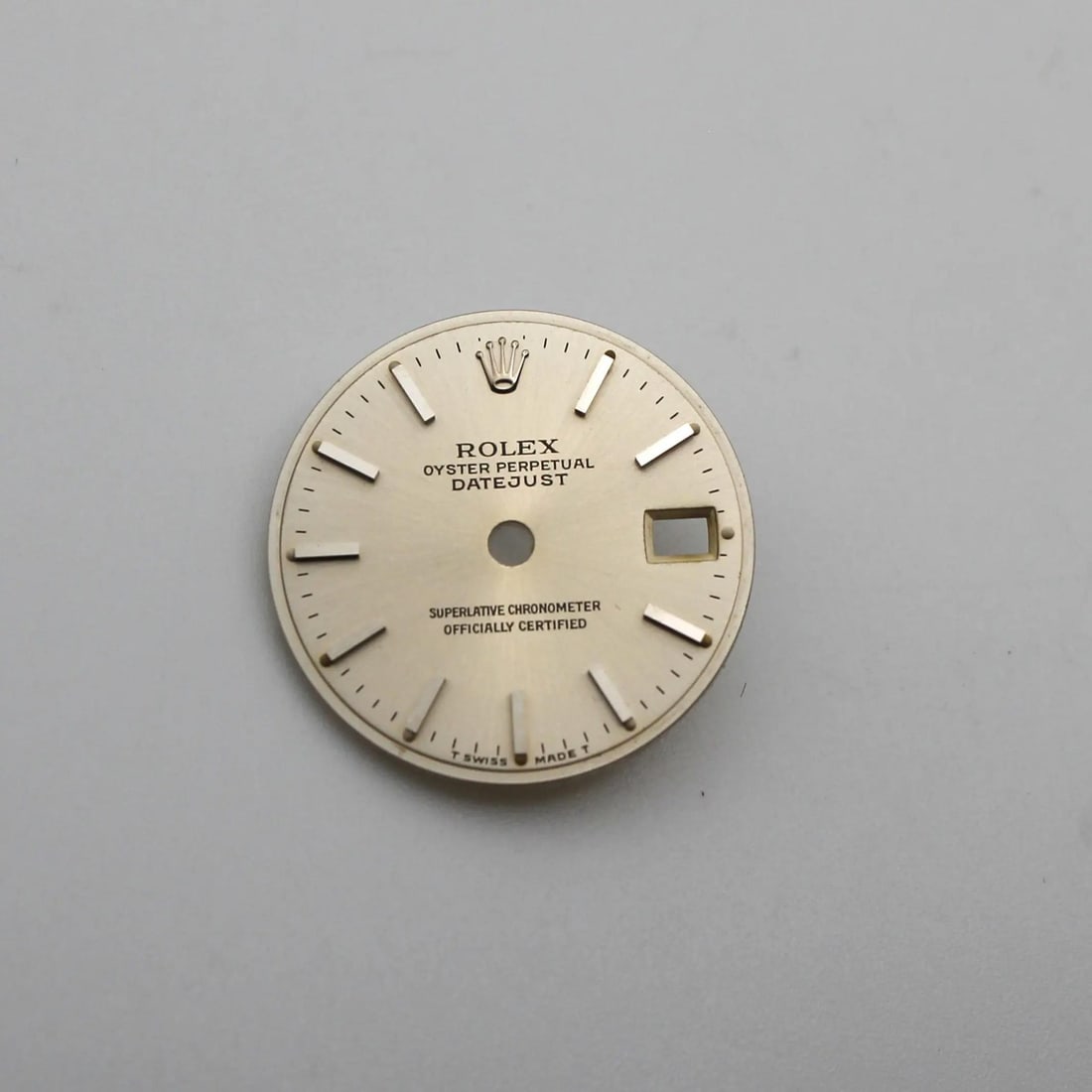Silver Dial for Rolex Datejust 69174 69179 Stick Markers T Swiss Made: Silver Dial for Rolex Datejust 69174 69179 Stick Markers T Swiss Made This is a pre-owned Rolex Oyster Perpetual Datejust dial in silver, designed with stick hour markers and marked 'T Swiss Made T'. 
