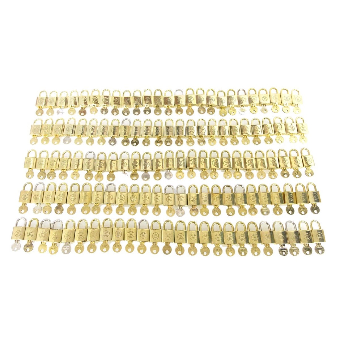 Louis Vuitton 125 Piece Set Gold Tone Padlock and Key Charms: Louis Vuitton 125 Piece Set Gold Tone Padlock and Key Charms Set of 125 Louis Vuitton old padlock and key bag accessory charms in gold-tone finish. This unisex accessory set shows overall signs of use