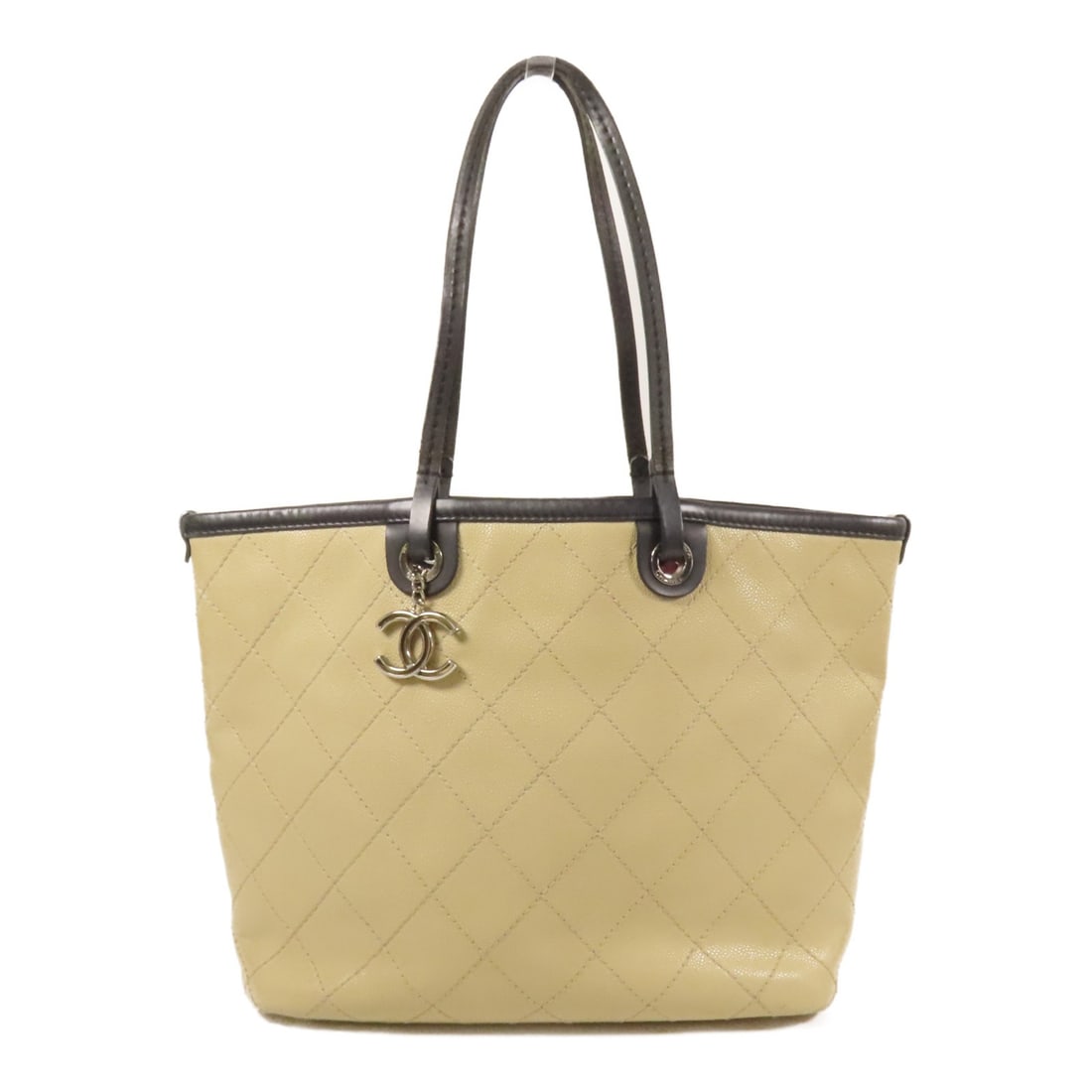 CHANEL CC Beige Calfskin Tote Shoulder Bag with SHW: CHANEL CC Beige Calfskin Tote Shoulder Bag with SHW Beige CHANEL tote bag in calfskin leather with CC SHW detailing and shoulder-carry design. The bag features an open interior with two open pockets a