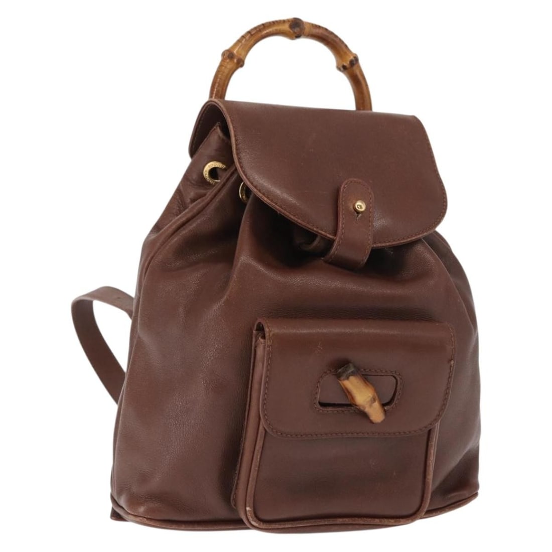 Brown Leather Gucci Bamboo Backpack Model 003 3444 0030 Gold Accents: Brown Leather Gucci Bamboo Backpack Model 003 3444 0030 Gold Accents This GUCCI Bamboo Backpack is crafted from brown leather with gold-tone accents. Made in Italy, it features a compact design with a