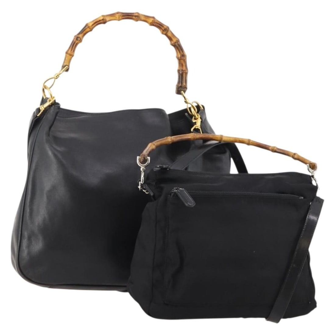 GUCCI black leather nylon shoulder bag 2-piece set with strap: GUCCI black leather nylon shoulder bag 2-piece set with strap Authentic Gucci 2-way shoulder bag in black leather with a bamboo detail and included shoulder strap. Made in Italy, this women's bag show