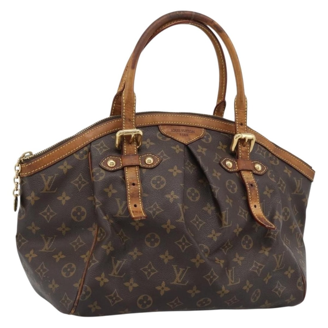 Louis Vuitton Tivori GM Monogram Canvas Handbag M40144 France: Louis Vuitton Tivori GM Monogram Canvas Handbag M40144 France Louis Vuitton Tivoli GM hand bag in Monogram Canvas, made in France. This women's bag is identified by product number M40144 and is offere