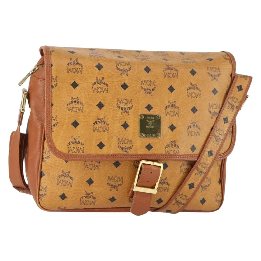 MCM Vicetos Shoulder Bag Brown Gold PVC Leather Germany: MCM Vicetos Shoulder Bag Brown Gold PVC Leather Germany Authentic MCM Vicetos logogram shoulder bag in brown and gold PVC leather. This women's shoulder bag is made in Germany and features an adjustab