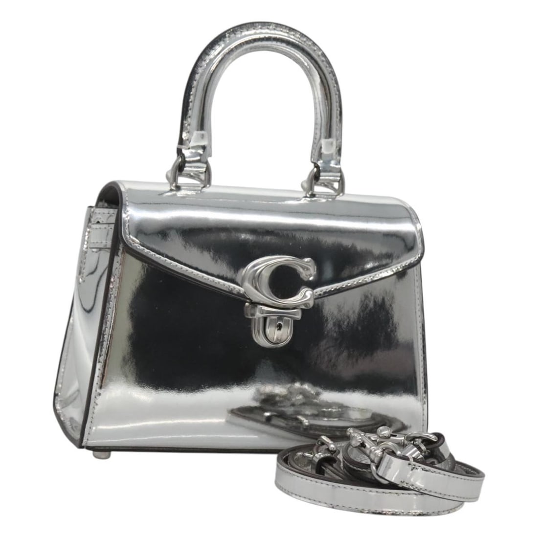 Coach MX335 Silver Leather 2way Handbag with Strap: Coach MX335 Silver Leather 2way Handbag with Strap Coach hand bag in silver leather, designed for women and made in Vietnam. This 2-way bag comes with a shoulder strap and clochette, and includes a du