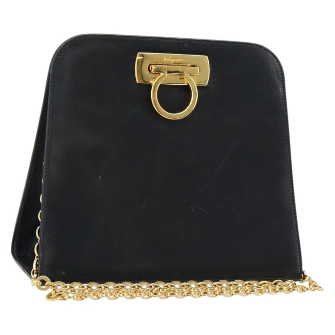 Salvatore Ferragamo navy gold leather Gancini shoulder bag Italy: Salvatore Ferragamo navy gold leather Gancini shoulder bag Italy This Salvatore Ferragamo Gancini chain shoulder bag is crafted from navy leather with gold-tone accents. Made in Italy, it features a c