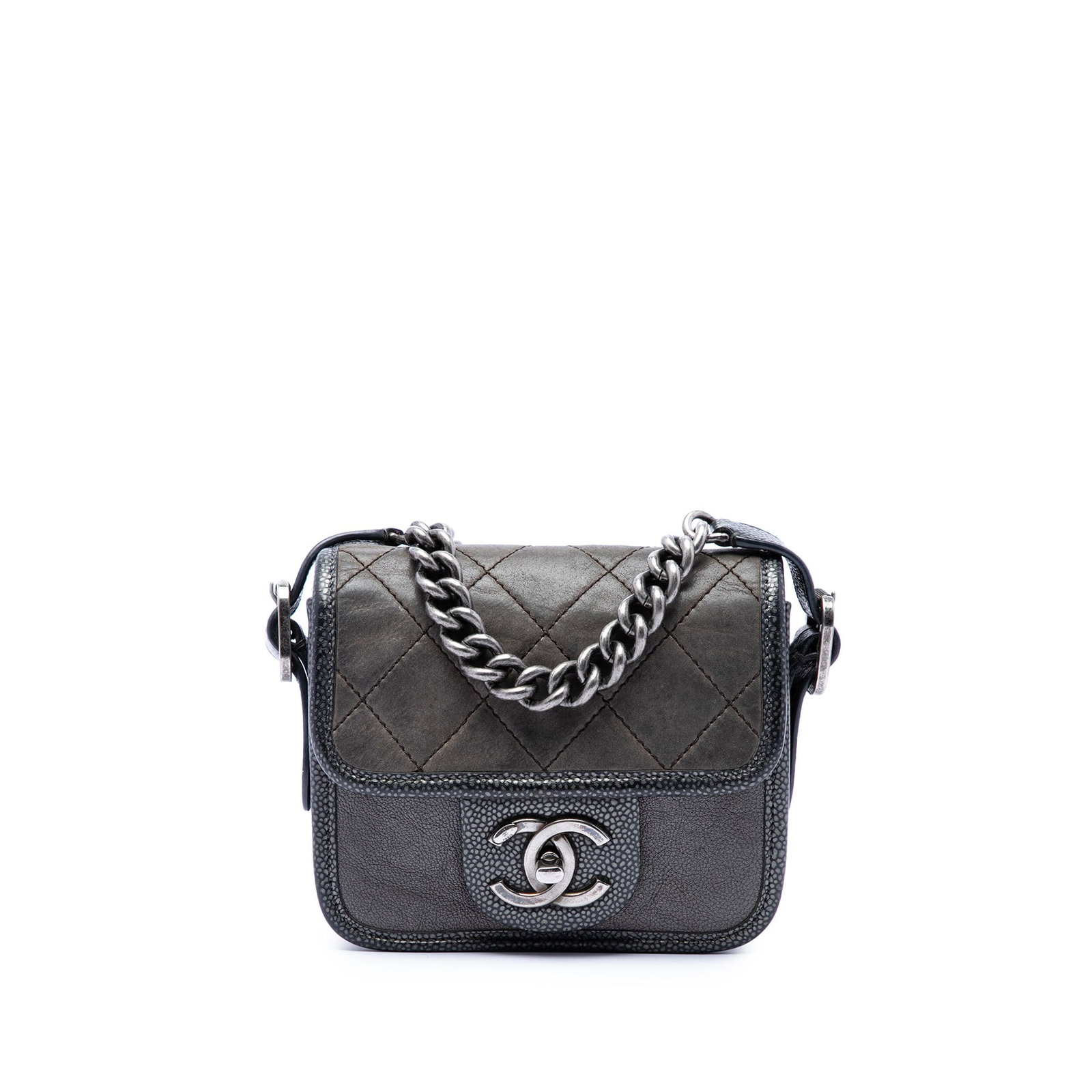 Chanel Paris Bombay Mini Flap Crossbody in Iridescent Gray Calfskin: Chanel Paris Bombay Mini Flap Crossbody in Iridescent Gray Calfskin Mini quilted iridescent calfskin crossbody bag from the Paris Bombay Back to School line. It features a leather body, a curb chain l