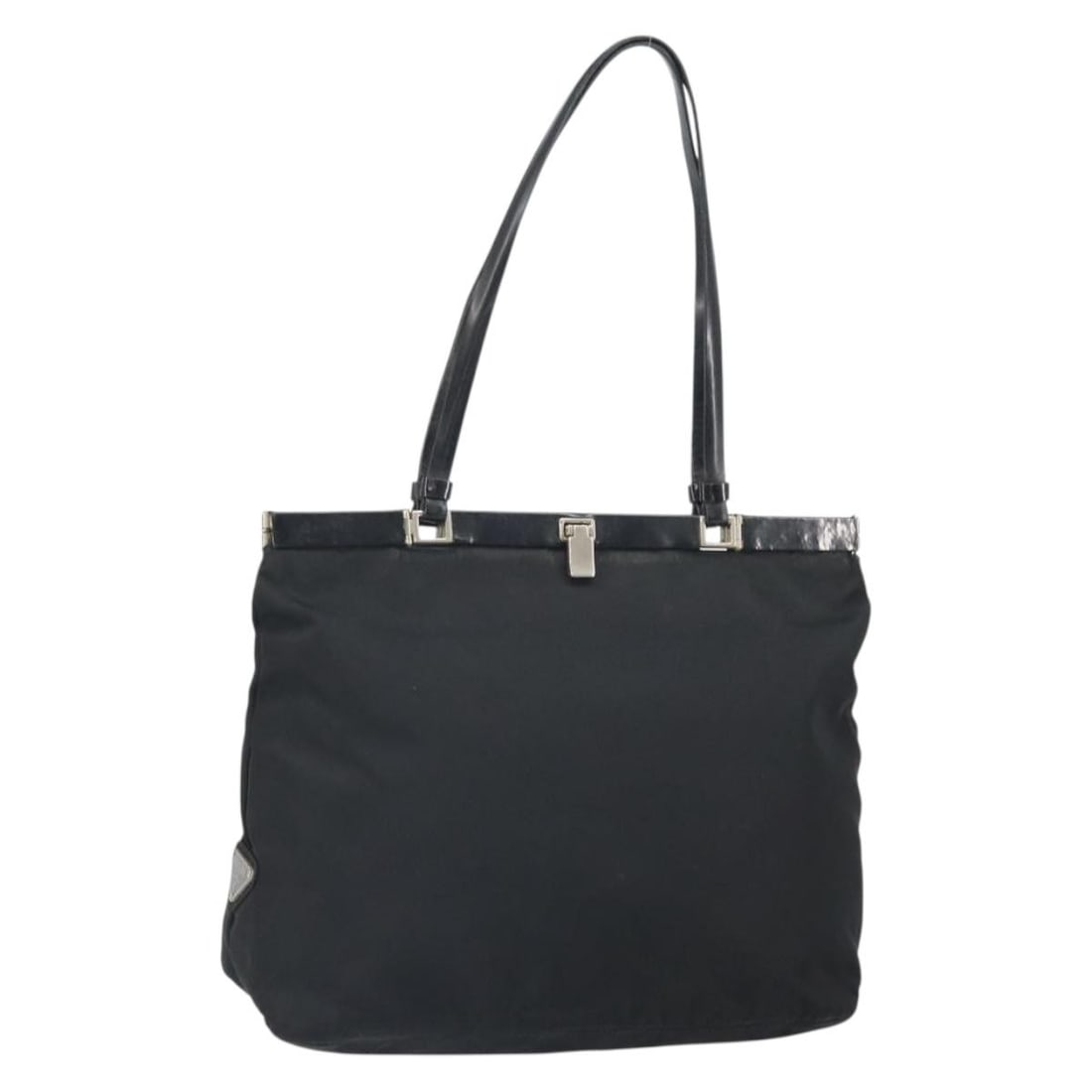 Black Silver Nylon Prada Tote Bag Made in Italy: Black Silver Nylon Prada Tote Bag Made in Italy This Prada tote bag is crafted from black nylon with silver-tone accents. It features a spacious interior with multiple pockets and a handle drop suitab