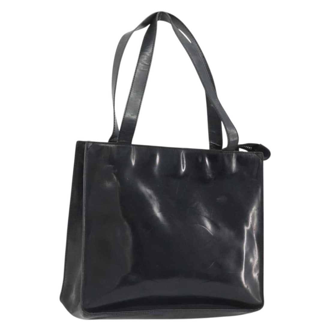 CHANEL Black Patent Enamel Tote Bag CC France: CHANEL Black Patent Enamel Tote Bag CC France Authentic CHANEL tote bag in black enamel with CC design. This women's bag was made in France and includes only the item shown, with no box or dust bag. C