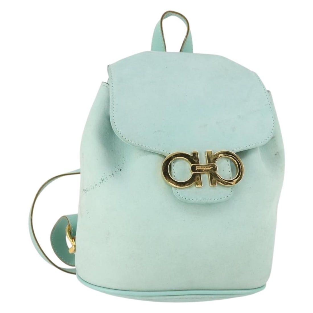 Green and Gold Suede Backpack by Salvatore Ferragamo Made in Italy: Green and Gold Suede Backpack by Salvatore Ferragamo Made in Italy This Salvatore Ferragamo backpack features a green suede exterior with gold-tone accents. It is crafted in Italy and designed with a 