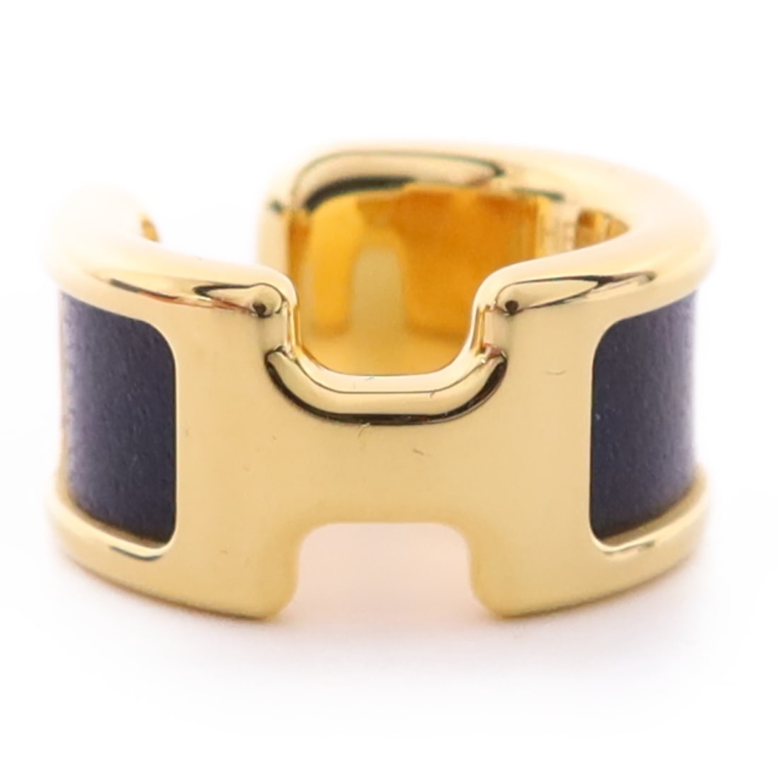 Hermes Olympe ear cuff in black leather and gold tone: Hermes Olympe ear cuff in black leather and gold tone Hermes Olympe ear cuff in black and gold with a metal and leather construction. It is a women's regular-size cuff, made in France, and comes with 