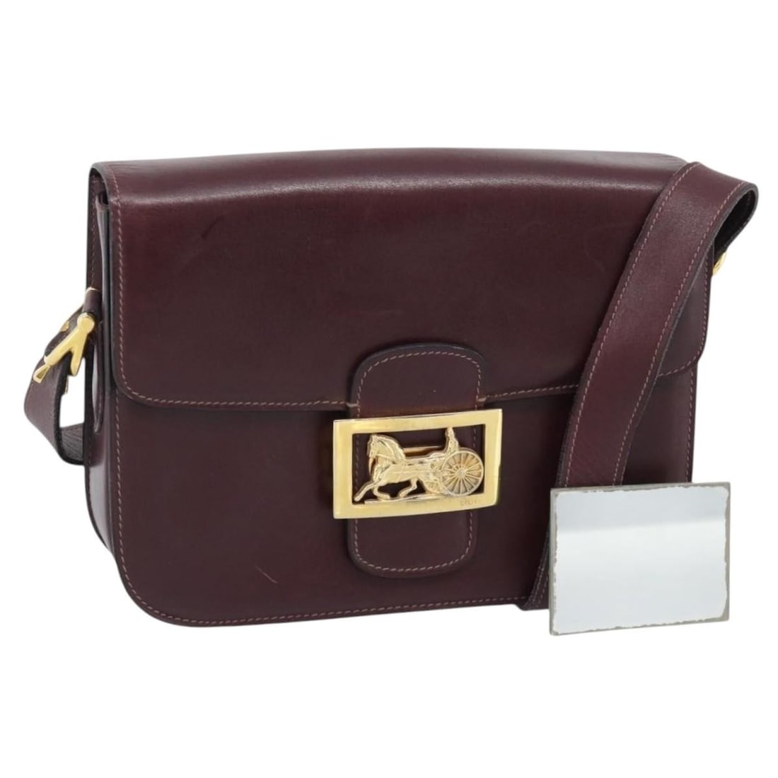 CELINE Horse Carriage Leather Shoulder Bag Bordeaux Gold Tone Mirror: CELINE Horse Carriage Leather Shoulder Bag Bordeaux Gold Tone Mirror Celine Horse Carriage shoulder bag in bordeaux leather with gold-tone accents. Made in Italy, this women's shoulder bag includes a 