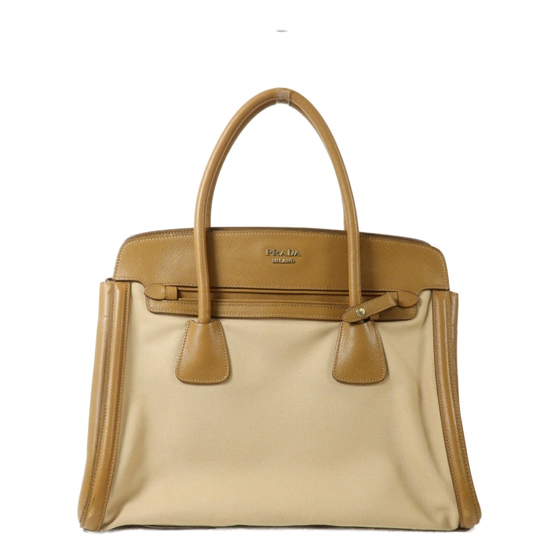 PRADA beige calfskin canvas handbag with gold tone hardware: PRADA beige calfskin canvas handbag with gold tone hardware Prada women's handbag in beige calfskin leather and canvas with a structured silhouette and gold-tone hardware. Made in Italy, this regular-