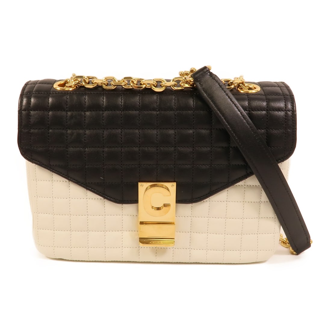 CELINE C Bag Shoulder Bag Black White Calfskin Leather GHW: CELINE C Bag Shoulder Bag Black White Calfskin Leather GHW A CELINE shoulder bag crafted from calfskin (cowhide) in black and white with a black frame color. It features a flap closure, an interior op