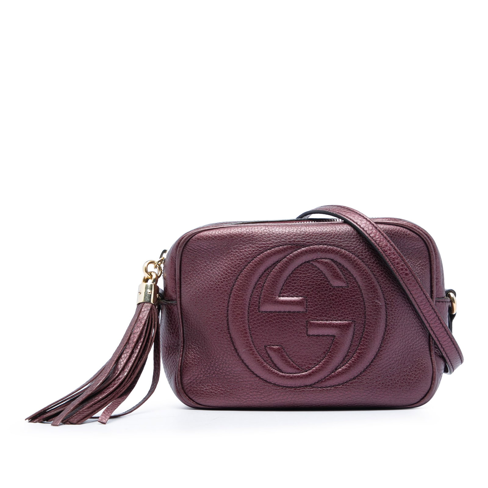 Gucci Soho Disco red leather crossbody bag with tassel: Gucci Soho Disco red leather crossbody bag with tassel Gucci Soho Disco crossbody bag in metallic calfskin leather with tassel detail and top zip closure. The interior includes slip pockets, and the a