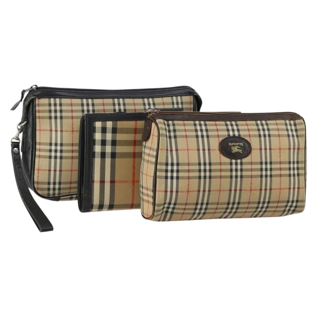 Set of 3 Burberrys Beige Canvas Nova Check Clutch Bags: Set of 3 Burberrys Beige Canvas Nova Check Clutch Bags This is a Burberrys clutch bag set featuring the classic Nova Check pattern in beige canvas. The set includes three pieces, each crafted from can