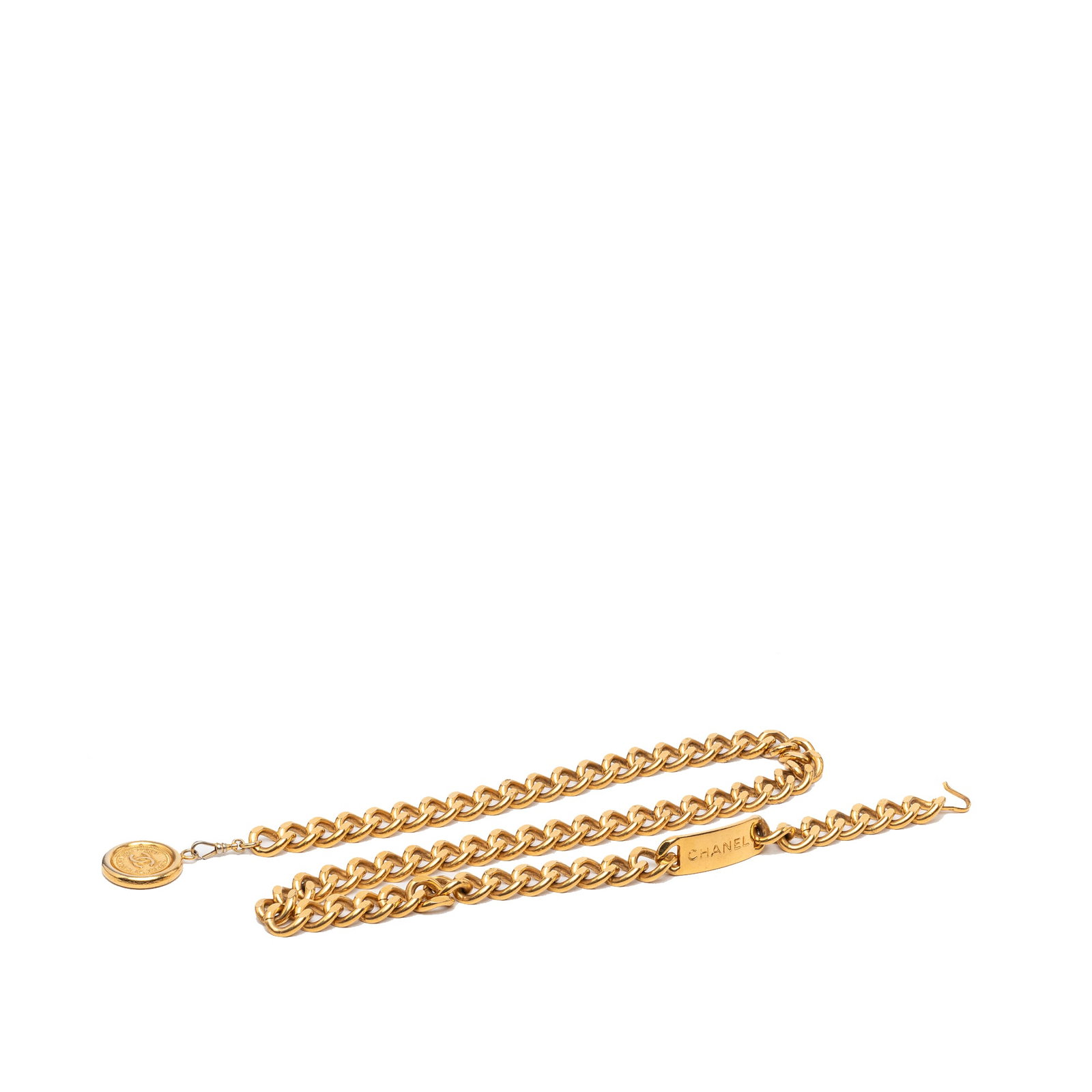 Chanel 31 Rue Cambon CC medallion gold tone chain belt: Chanel 31 Rue Cambon CC medallion gold tone chain belt Chanel CC 31 Rue Cambon medallion chain belt featuring a gold tone metal chain, medallion charm, and hook closure. Made in France. Condition is B