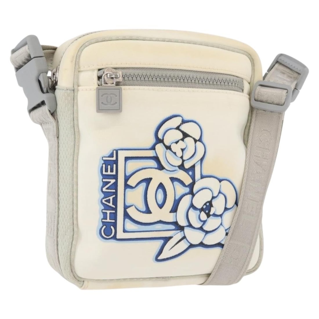 CHANEL Camelia Nylon Shoulder Bag White Silver CC: CHANEL Camelia Nylon Shoulder Bag White Silver CC Chanel Sports Camelia shoulder bag in white and silver nylon. This women's shoulder bag was made in France and includes only the item shown; the origi