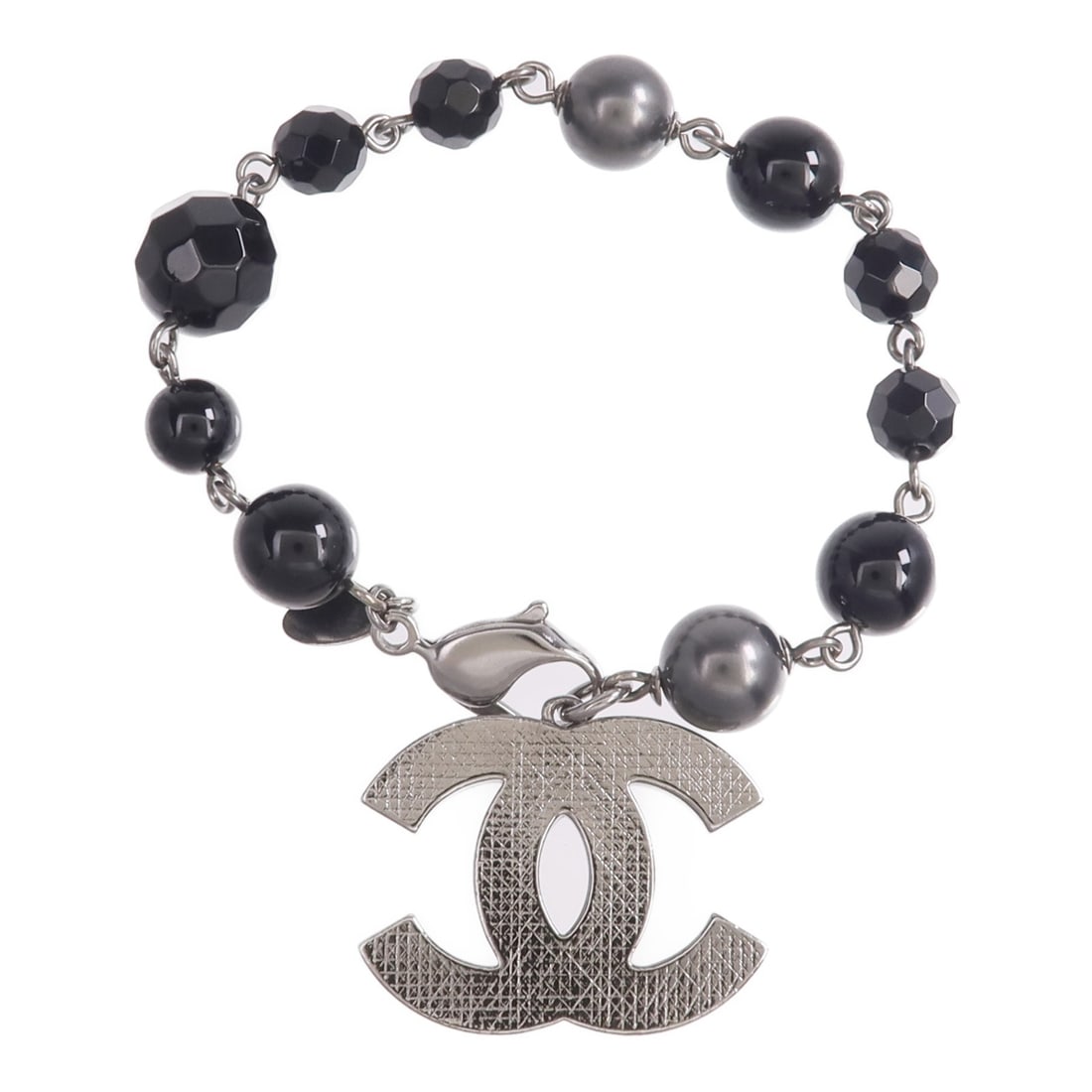 CHANEL D11V CC Bracelet Black PVC and Gunmetal Metal: CHANEL D11V CC Bracelet Black PVC and Gunmetal Metal CHANEL CC bracelet model D11V in black and gunmetal, made from metal and PVC. It features the CC motif and is sized for a wrist size of approximate