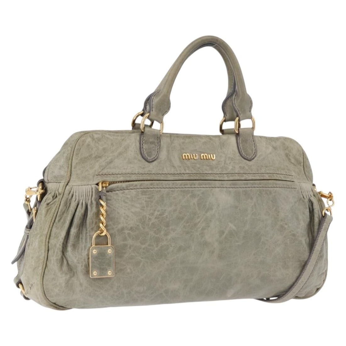 Miu Miu Green Leather 2way Handbag with Shoulder Strap: Miu Miu Green Leather 2way Handbag with Shoulder Strap Miu Miu 2-way leather handbag in green with gold-tone accents, designed for women and made in Italy. This bag includes a shoulder strap and can b