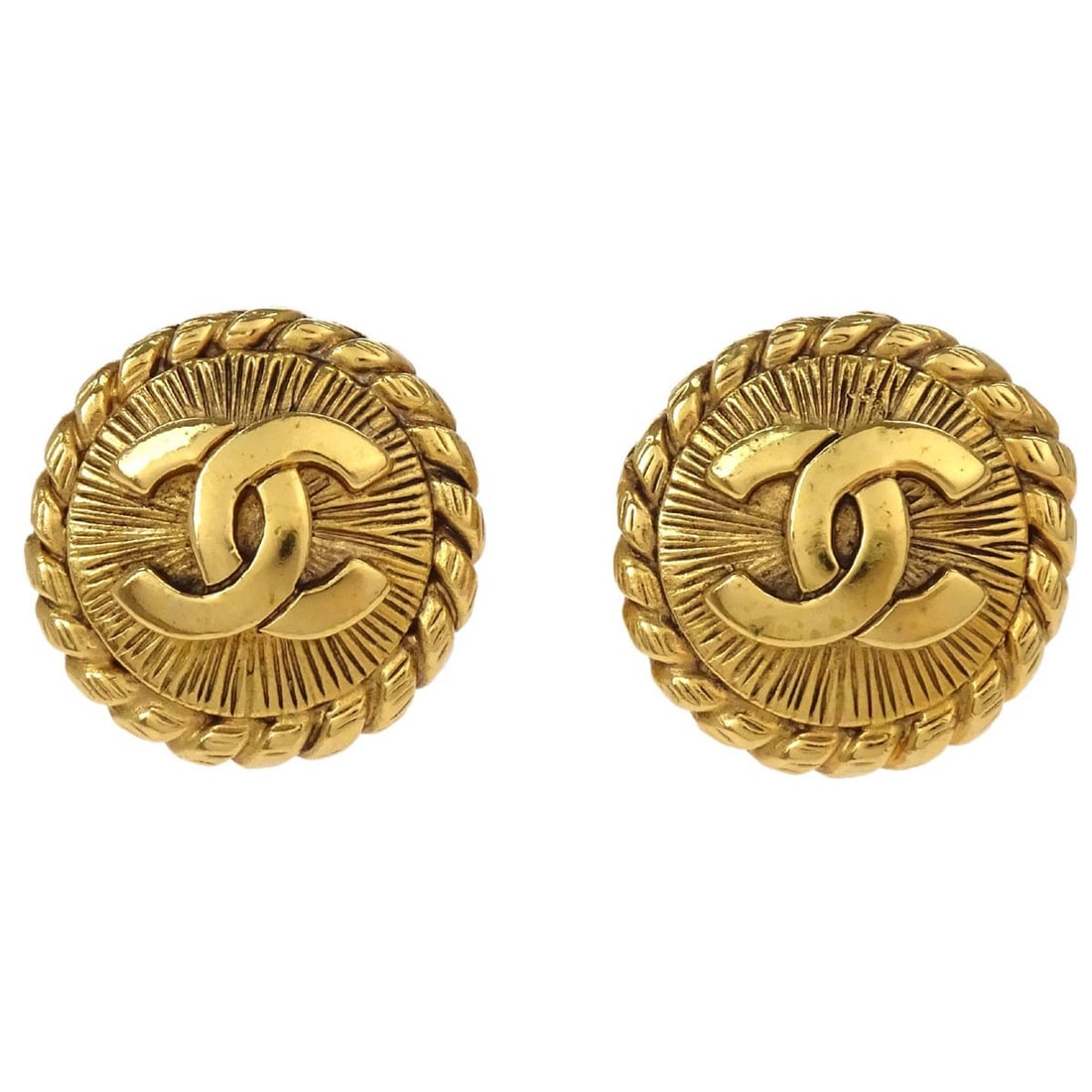 Chanel Button Clip On Earrings Gold Tone France: Chanel Button Clip On Earrings Gold Tone France Chanel button clip-on earrings in a gold tone finish, featuring a logo theme and made in France. The earrings are described as being in very good condit