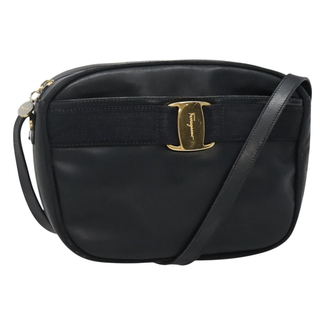 Salvatore Ferragamo Vara Bow Camera Bag Navy Leather: Salvatore Ferragamo Vara Bow Camera Bag Navy Leather Salvatore Ferragamo Vara Bow camera bag in navy leather. This women's bag is made in Italy and shows honest vintage wear consistent with good condi