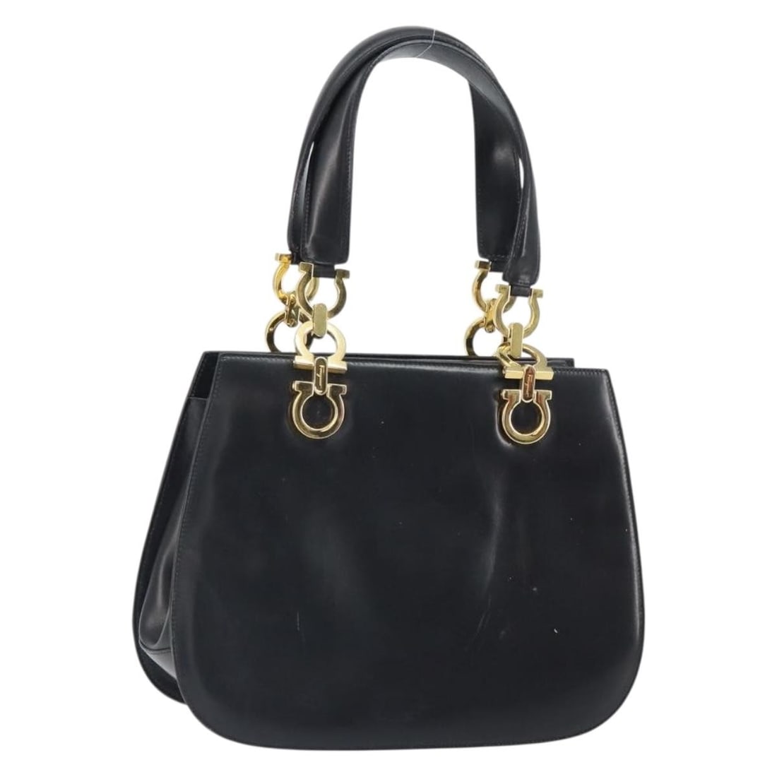 Black Leather Gancini Handbag Salvatore Ferragamo Gold Tone 162144: Black Leather Gancini Handbag Salvatore Ferragamo Gold Tone 162144 Salvatore Ferragamo Gancini handbag in black leather with gold-tone accents. This women's handbag was made in Italy and includes only