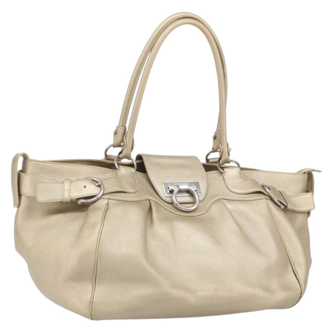 Gancini Leather Handbag Gold Tone by Salvatore Ferragamo: Gancini Leather Handbag Gold Tone by Salvatore Ferragamo This Salvatore Ferragamo Gancini handbag features gold-colored leather and is crafted in Italy. The bag offers ample storage with a structured 
