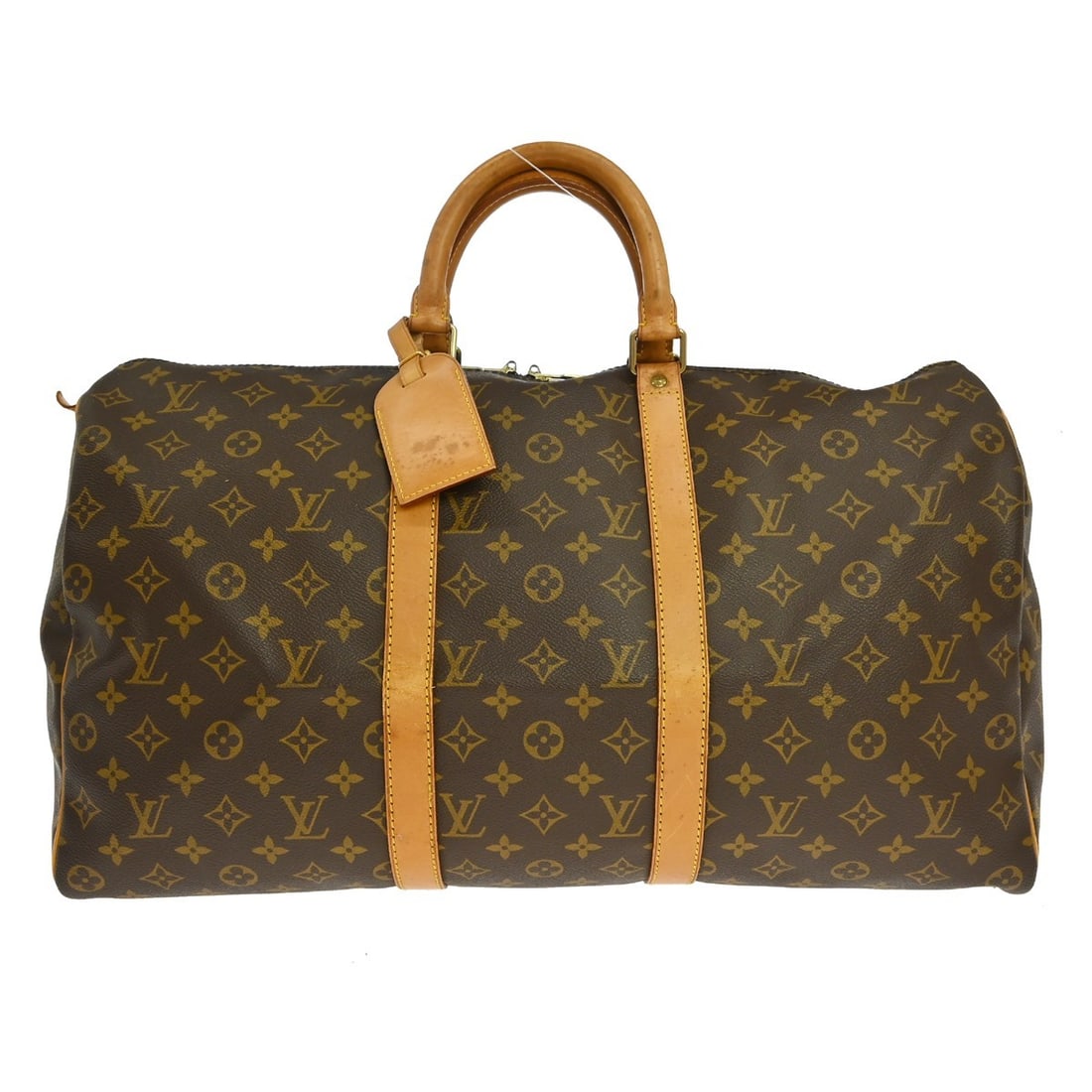 Louis Vuitton Keepall Travel Bag in Brown Monogram Canvas: Louis Vuitton Keepall Travel Bag in Brown Monogram Canvas Louis Vuitton Keepall in brown monogram canvas. This unisex bag is in good overall condition, with scuffs and scratches on the exterior, dirt 